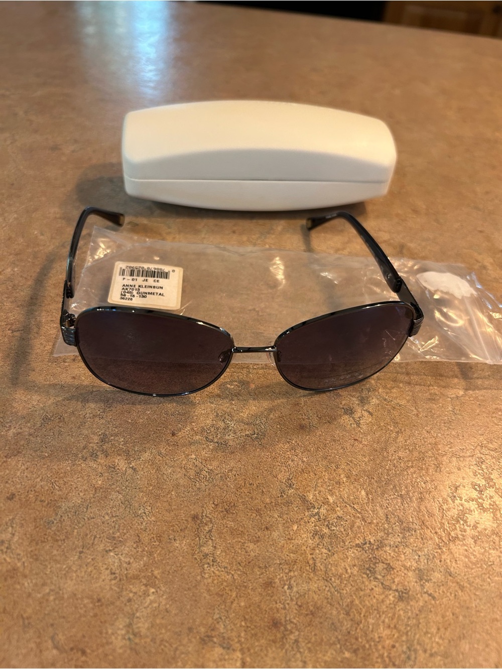 Anne Klein Black Metal Frame Sunglasses with Dark Lenses